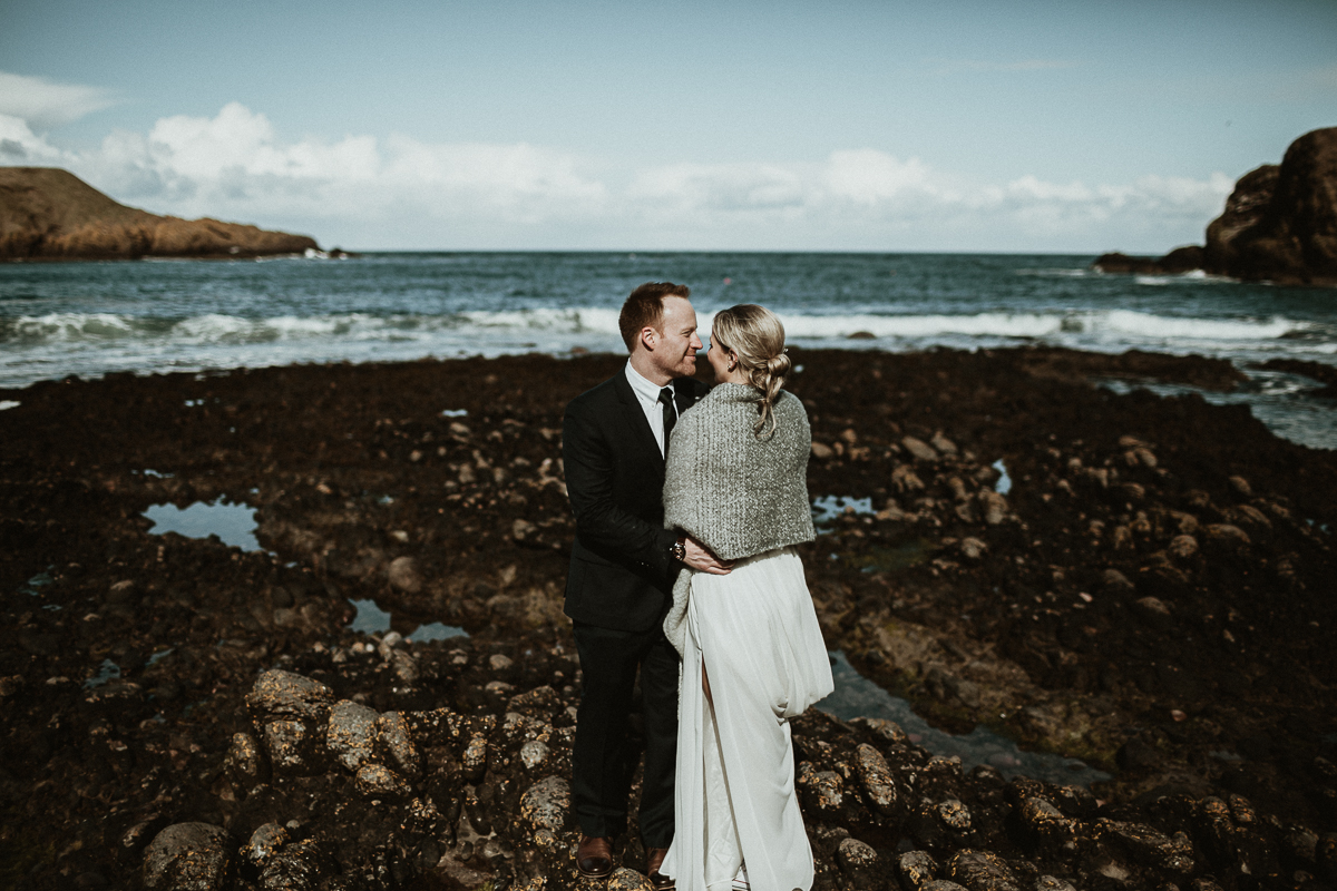 Intimate Elopement session on the rocky beach in Scotland